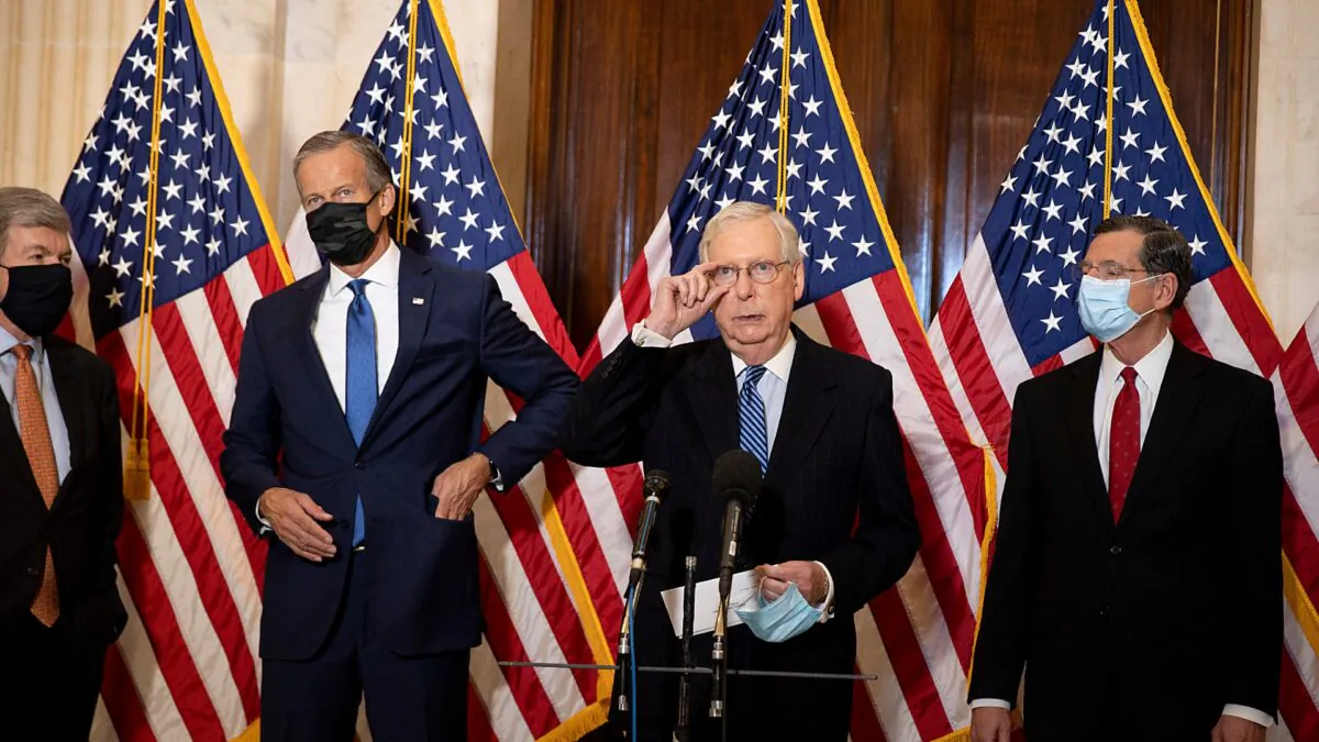 (L-R) Sens. Roy Blunt (R-Mo.), John Thune (R-S.D.), Majority Leader Mitch McConnell (R-Ky.) and John Barrasso (R-Wyo.) speak to the media at the U.S. Capitol in Washington, on Nov. 10, 2020. (Tasos Katopodis/Getty Images)
