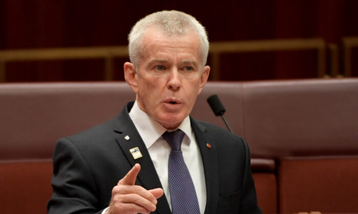 Senator Malcolm Roberts debates the Treasury Laws Amendment (Tax Relief So Working Australians Keep More Of ir Money) Bill 2019, in the Senate at Parliament House in Canberra, Australia on July 4, 2019. (Tracey Nearmy/Getty Images)