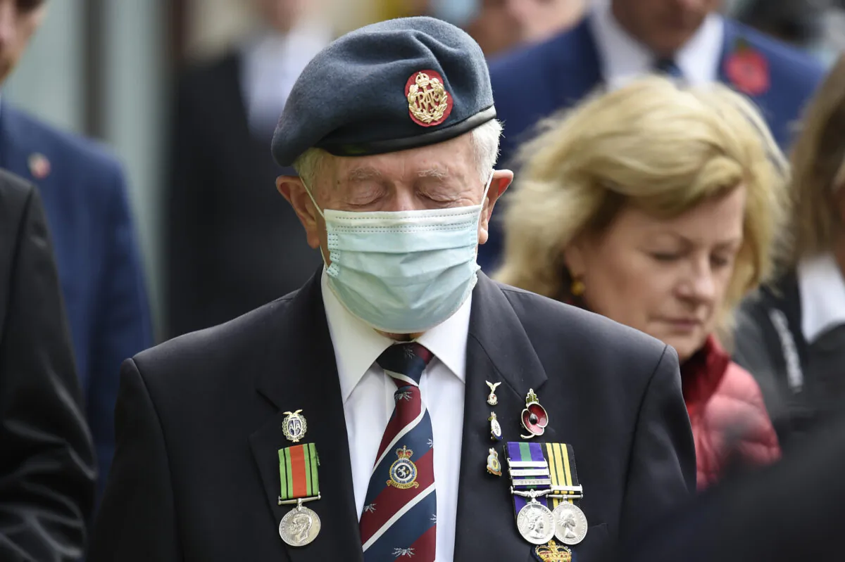 Veterans observe a 2-minute silence for Armistice day in remembrance of the nations war dead on Nov. 11, 2020, at the Cenotaph in London. (Daniel Leal-Olivas/AFP) 