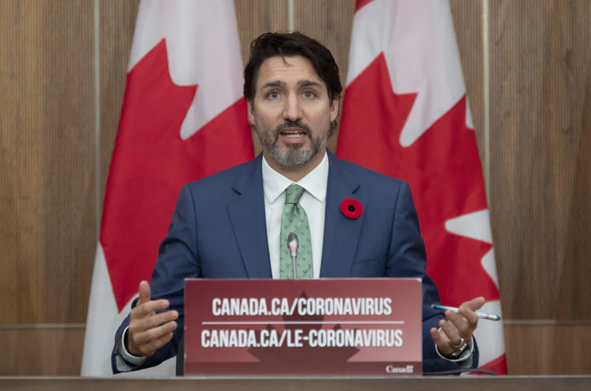 Prime Minister Justin Trudeau gestures as he responds to a reporter's question during a news conference in Ottawa, on November 6, 2020. (The Canadian Press/Adrian Wyld)