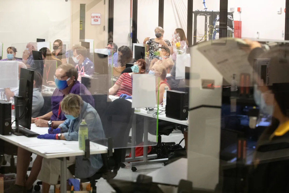 Votes are counted by staff at the Maricopa County Elections Department office in Phoenix, Arizona, on Nov. 5, 2020. (Courtney Pedroza/Getty Images)