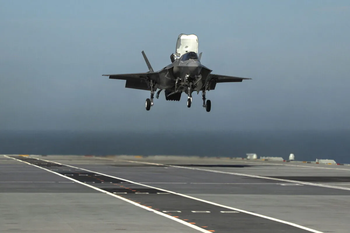 An F-35B lands onboard HMS Queen Elizabeth in Portsmouth, England, on Sept. 26, 2018. (PO Arron Hoare/Ministry of Defence via Getty Images)
