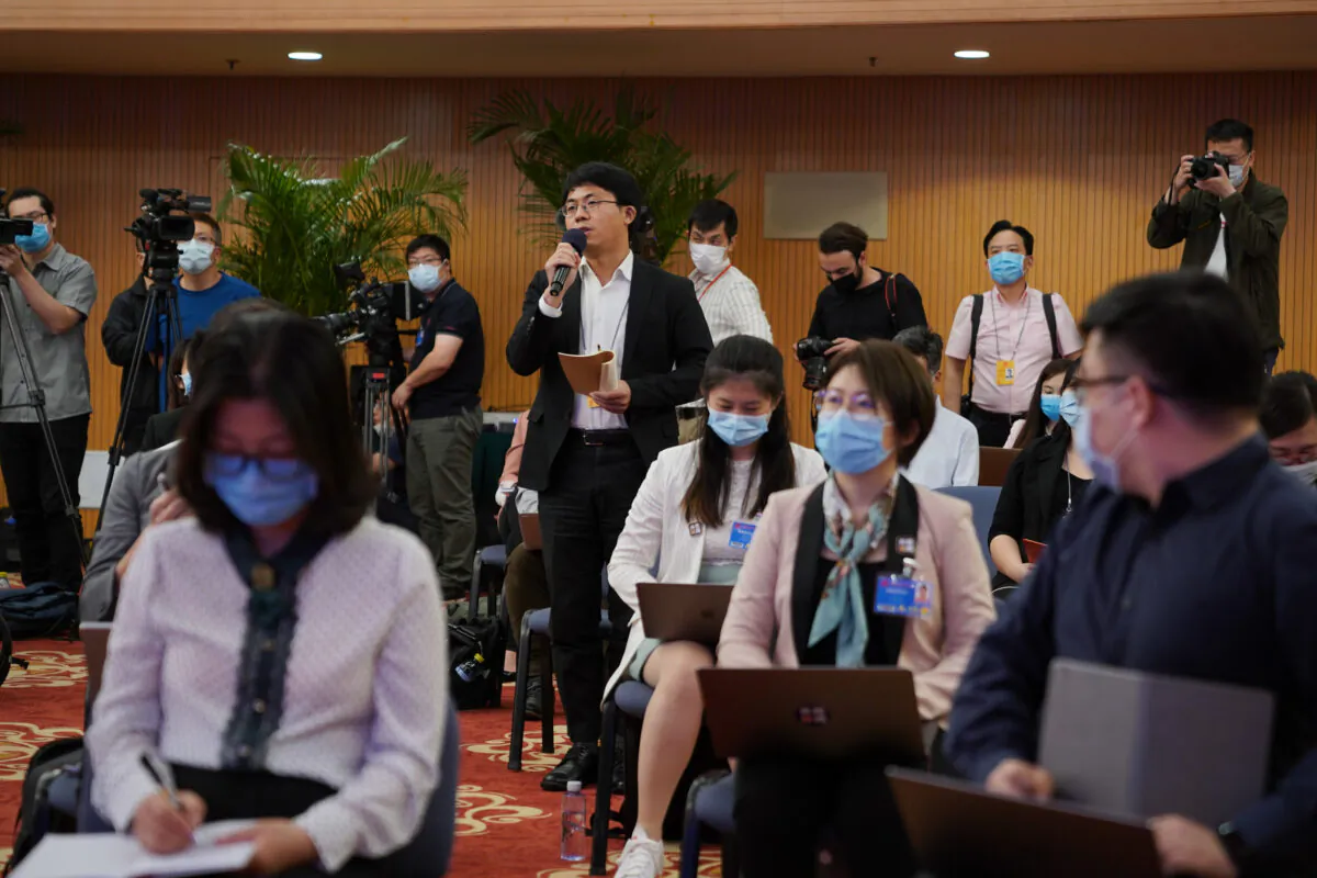Journalists attend a video press conference that was hosted by Chinese Foreign Minister Wang Yi in Beijing, China on May 24, 2020. (Andrea Verdelli/Getty Images)