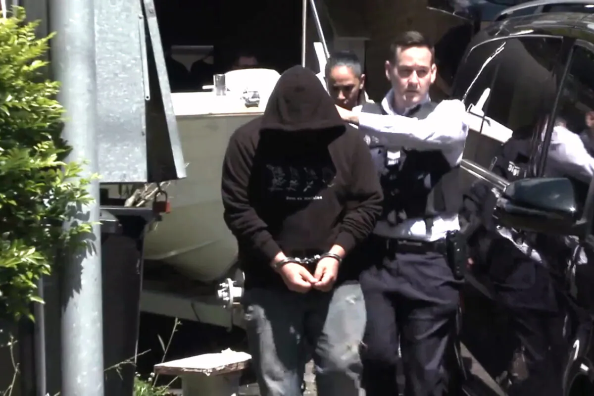 Operation Arkstone first arrest, Sydney, NSW, Australia, February 2020. (AFP)