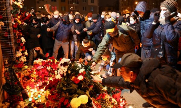 People gather to mourn the death of anti-government protester Roman Bondarenko