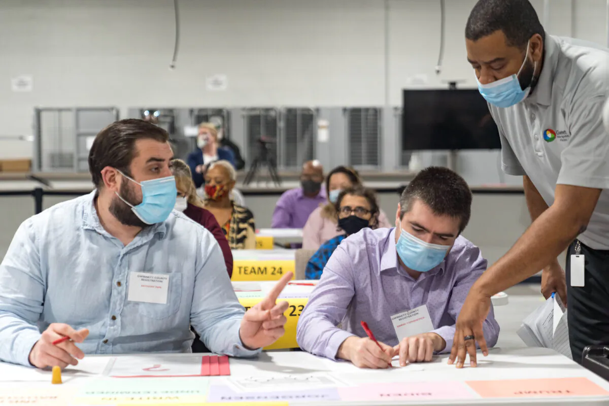 Gwinnett County workers begin a recount of presidential election ballots in Lawrenceville, Ga., on Nov.13, 2020. (Megan Varner/Getty Images)