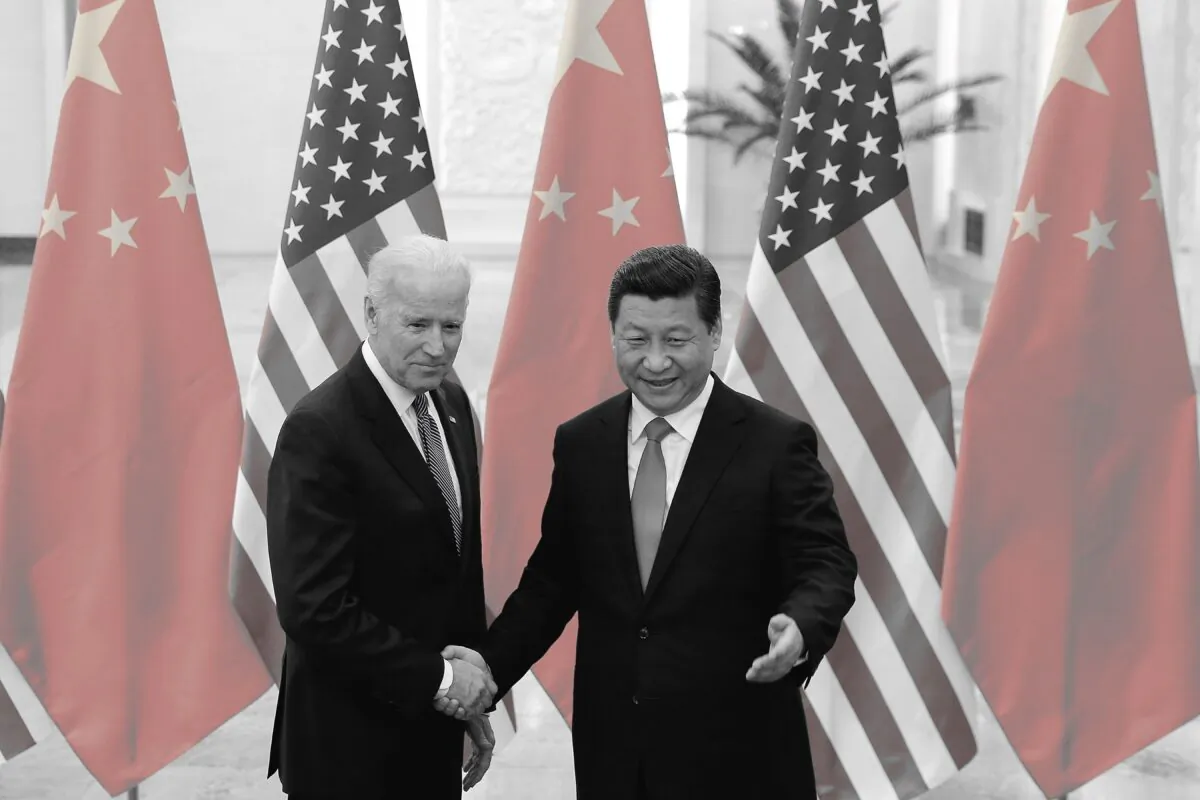 Chinese leader Xi Jinping shakes hands with then U.S. Vice President Joe Biden inside the Great Hall of the People in Beijing, China, on Dec. 4, 2013. (Lintao Zhang/Getty Images)