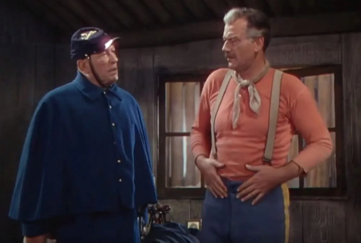 Victor McLaglen (L) and John Wayne in “She Wore a Yellow Ribbon.” (Warner Archive Collection)