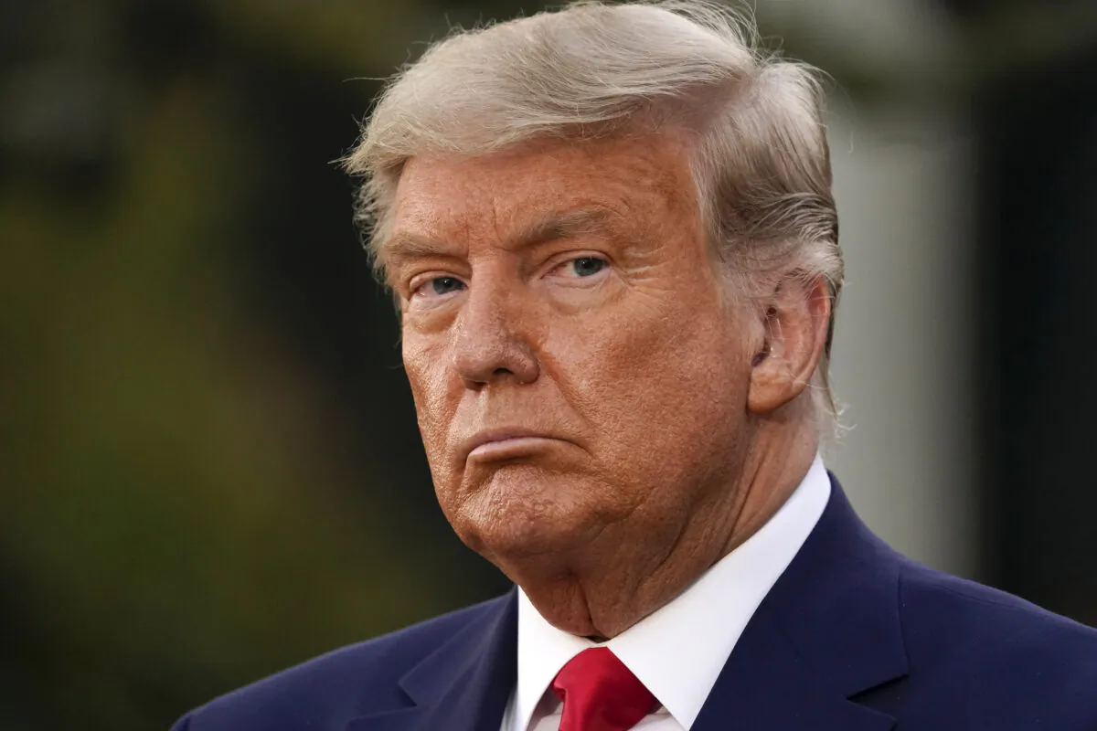 President Donald Trump listens during an event on Operation Warp Speed in the Rose Garden of the White House in Washington on Nov. 13, 2020. (Evan Vucci/AP Photo)