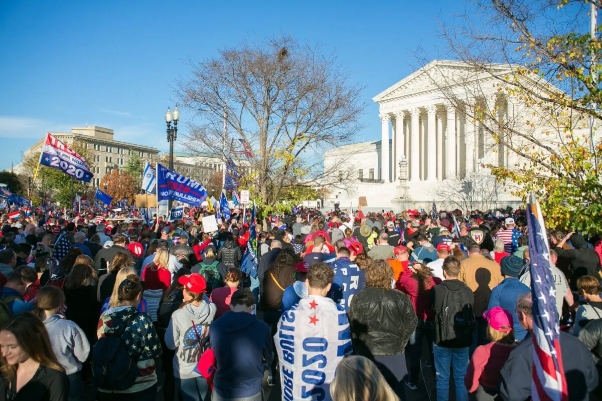 Trump supporters participate in the “Stop the Steal” rally from Freedom Plaza to the Supreme Court in Washington, on Nov. 14, 2020. (Lisa Fan/Epoch Times)
