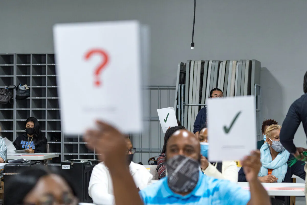 Gwinnett county workers begin their recount of the ballots in Lawrenceville, Ga., on Nov. 13, 2020. (Megan Varner/Getty Images)