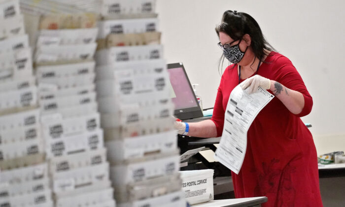 Arizona elections officials continue to count ballots inside the Maricopa County Recorder's Office in Phoenix on Nov. 6, 2020. (Matt York/AP Photo)