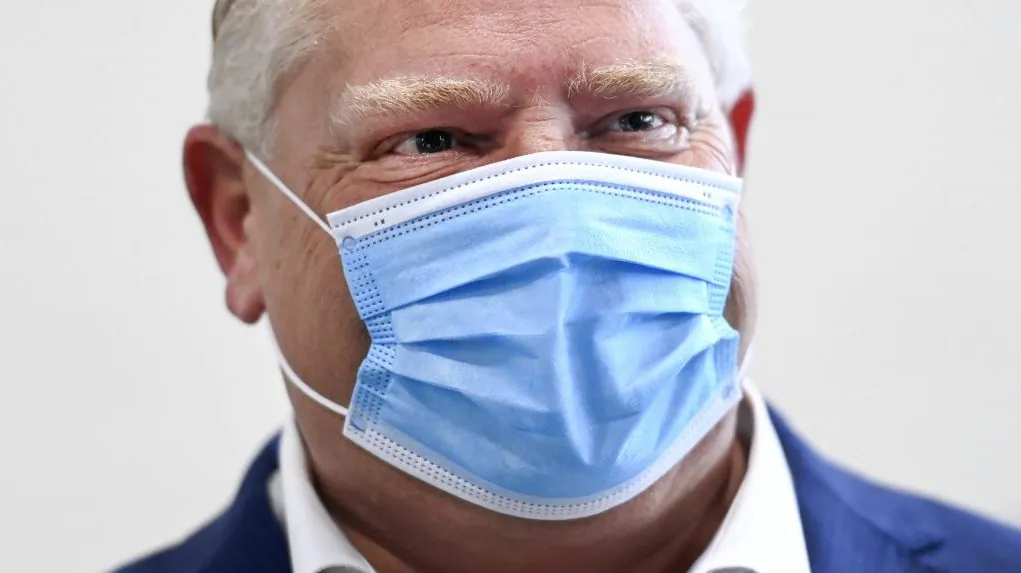 Ontario Premier Doug Ford tours a warehouse where they ship personal protective equipment during the COVID-19 pandemic in Milton on Sept. 30, 2020. (The Canadian Press/Nathan Denette)