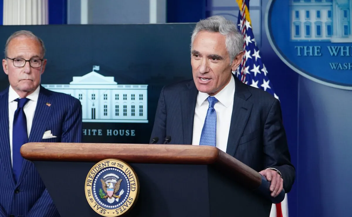 White House coronavirus adviser Dr. Scott Atlas (R) speaks as Larry Kudlow (L), Director of the United States National Economic Council, listens during a press conference in the Brady Briefing Room of the White House on Sept. 23, 2020. (Mandel Ngan/AFP via Getty Images)