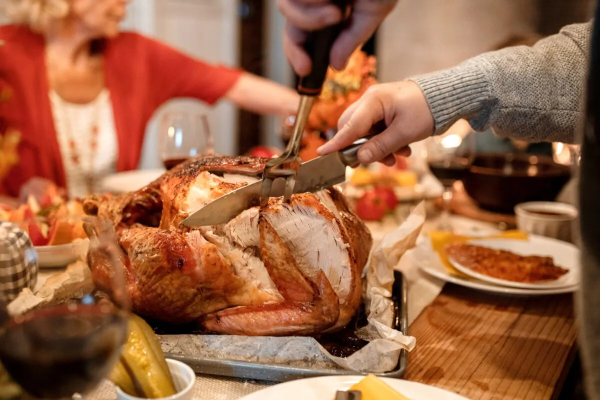 A file photo of a turkey being carved. (RODNAE Productions/Pexels)