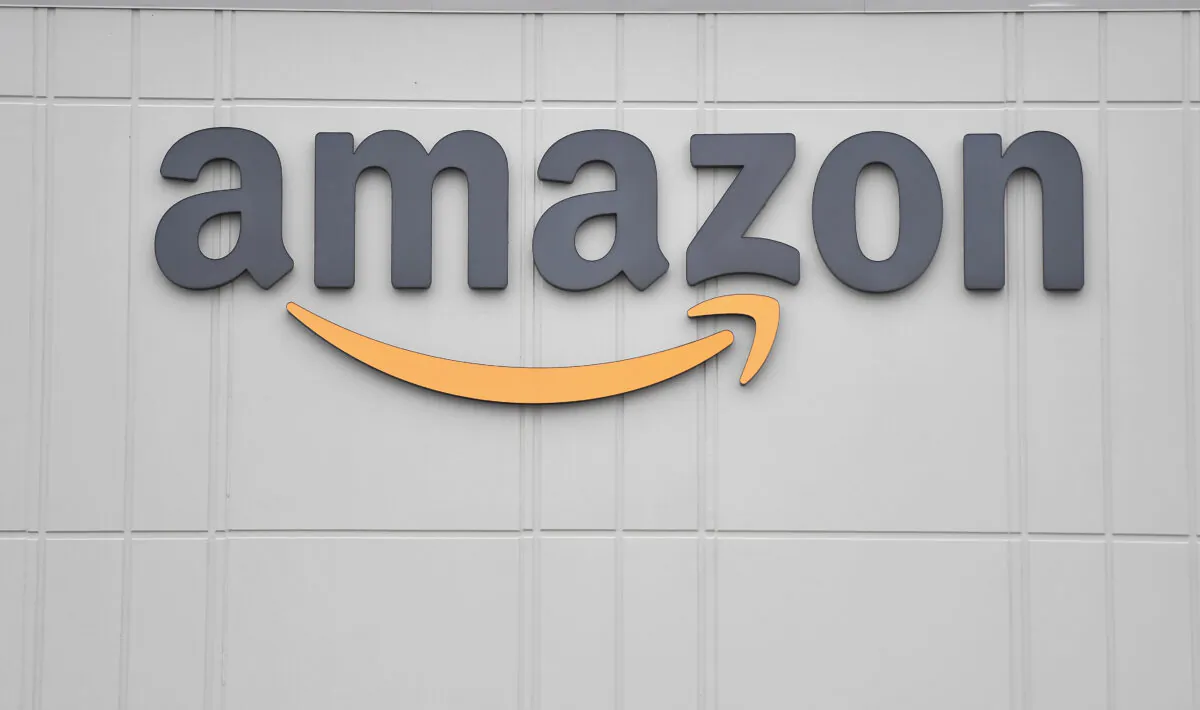 The logo of U.S. online retail giant Amazon is seen at the distribution center in Staten Island, N.Y., on March 30, 2020. (Angela Weiss/AFP via Getty Images)