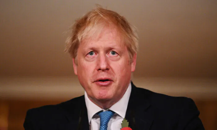 UK Prime Minister Boris Johnson answers questions during a briefing on the current CCP virus pandemic in Downing Street, London, on Nov. 5, 2020. (Leon Neal/WPA Pool/Getty Images)