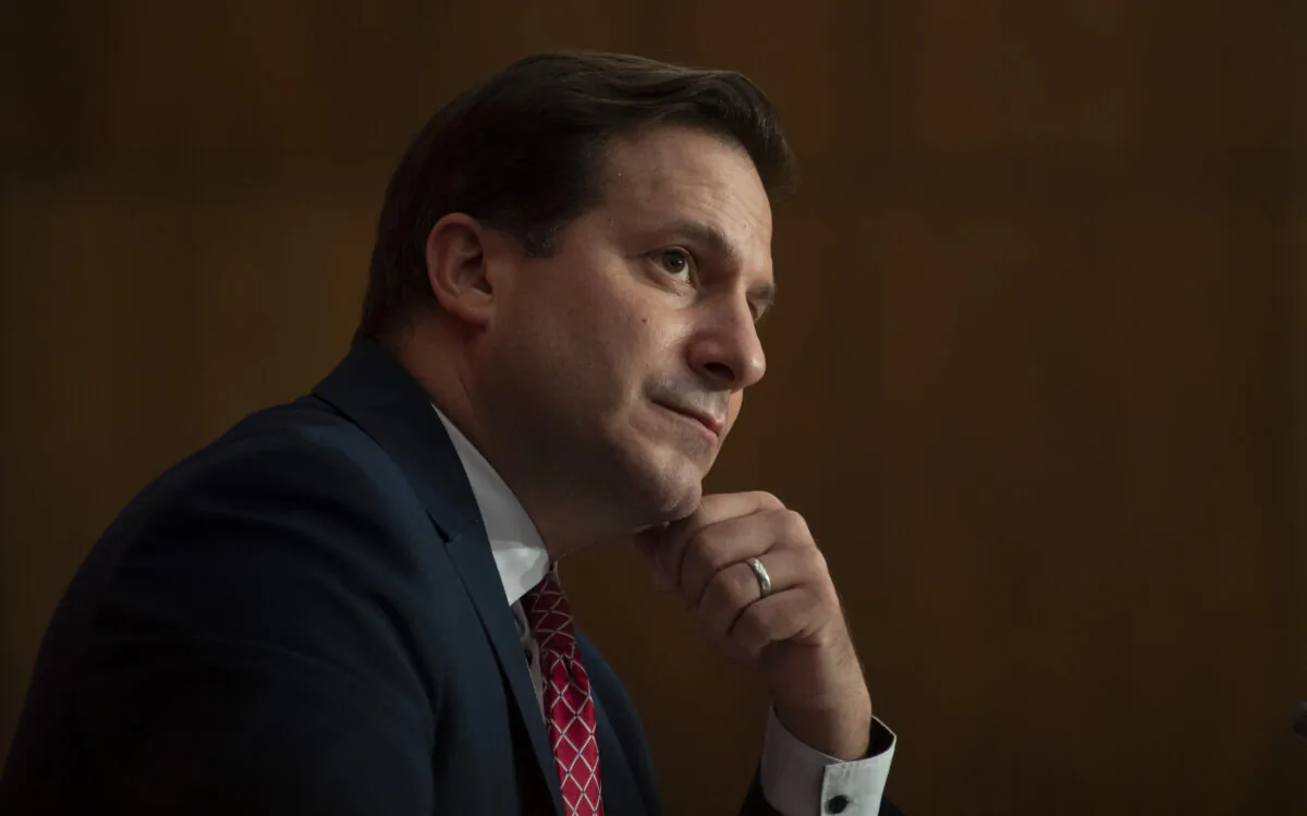 Immigration, Refugees and Citizenship Minister Marco Mendicino listens to speakers during a news conference in Ottawa, on Oct. 2, 2020. (Adrian Wyld/The Canadian Press)