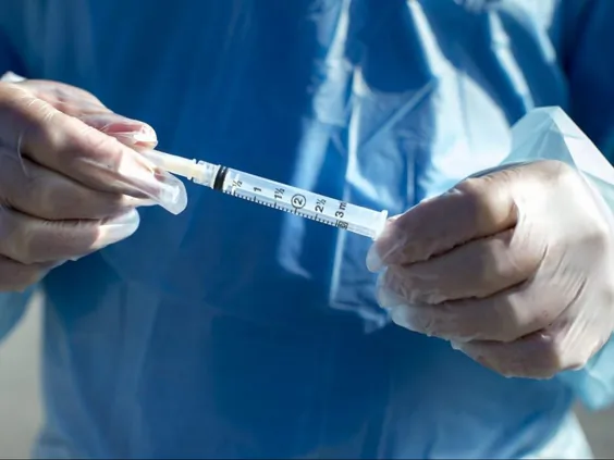 A needle and syringe used to administer the flu shot in shown in Virgil, Ont., on Oct. 5, 2020. (The Canadian Press/Tara Walton)