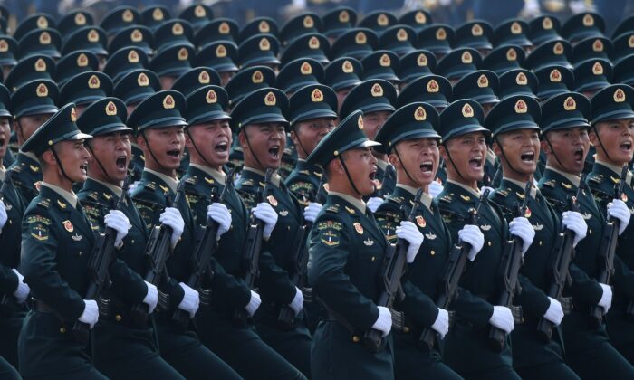 Chinese troops march during a military parade in Tiananmen Square in Beijing on Oct. 1, 2019. (Greg Baker/AFP via Getty Images)