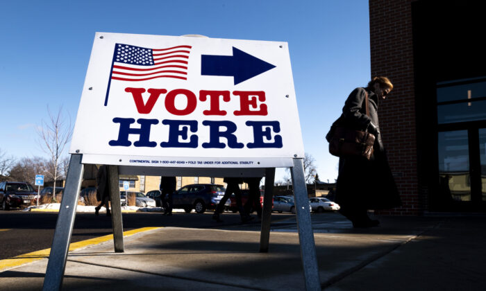 A voter arrives at a polling place in Minneapolis, on March 3, 2020. (Stephen Maturen/Getty Images)