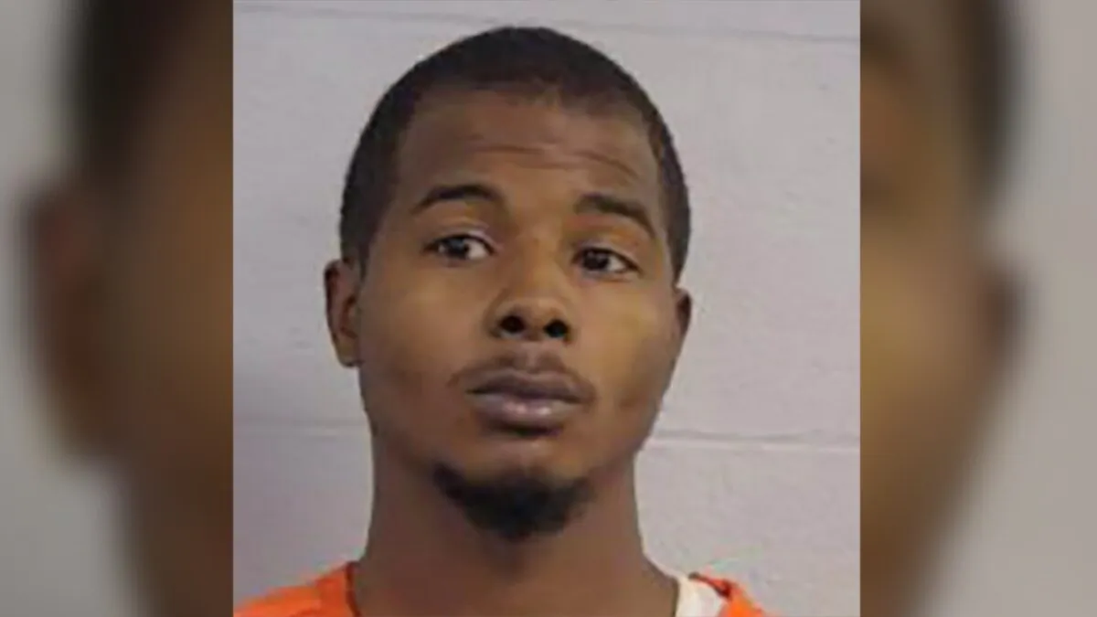 This photo provided by the Louisville Police Department shows Larynzo Johnson, 26. (Courtesy of Louisville Metro Police Department)