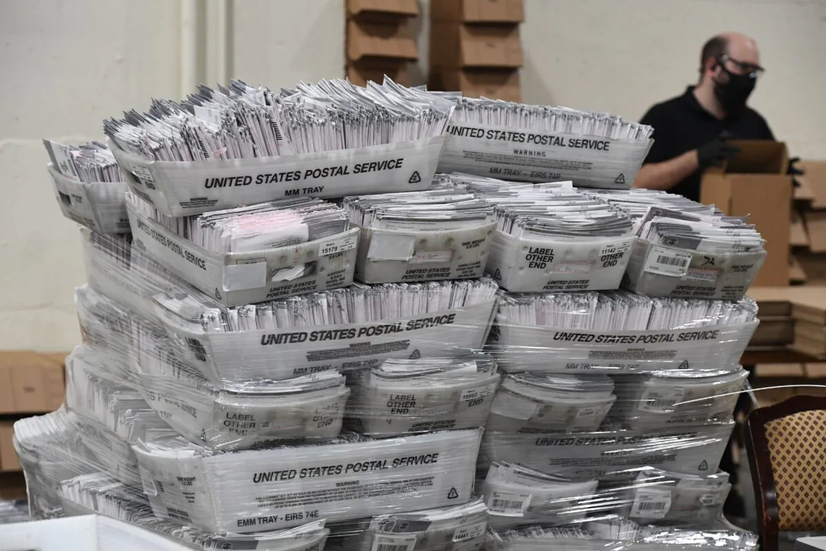 Mail-in ballots in their envelopes await processing at the Los Angeles County Registrar Recorders' mail-in ballot processing center in Pomona, California, on Oct. 28, 2020. (ROBYN BECK/AFP via Getty Images)