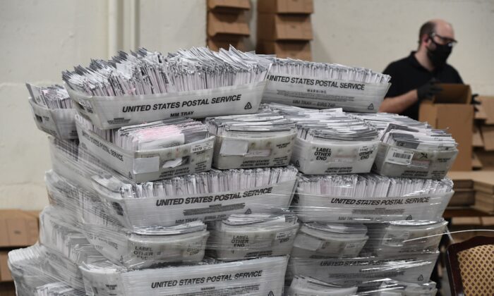 Mail-in ballots in their envelopes await processing at the Los Angeles County Registrar Recorders' mail-in ballot processing center in Pomona, Calif., on Oct. 28, 2020. (Robyn Beck/AFP via Getty Images)