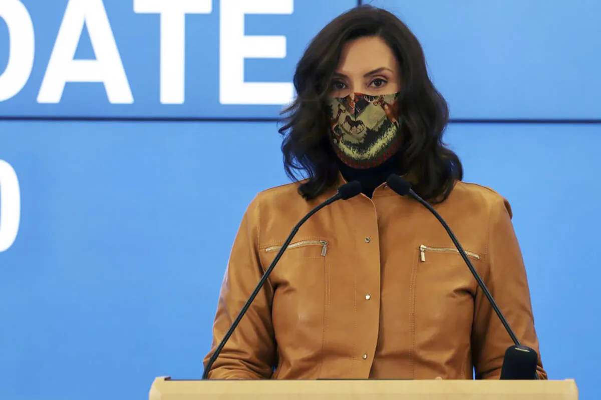 Michigan Gov. Gretchen Whitmer announces new restrictions amid the COVID-19 pandemic in Lansing, Mich., on Nov. 15, 2020. (Michigan Office of the Governor via AP)