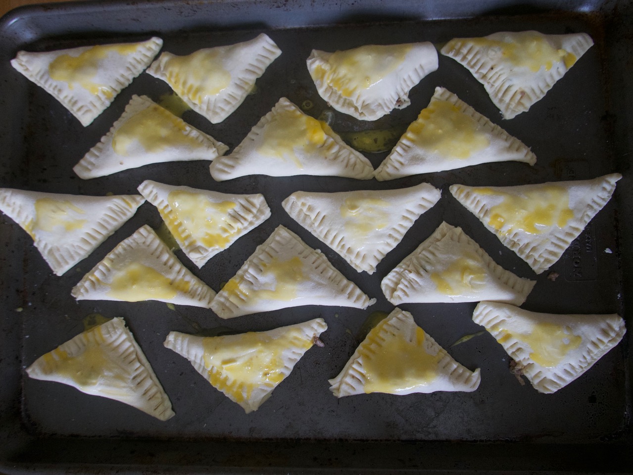 turnovers sealed and brushed with egg