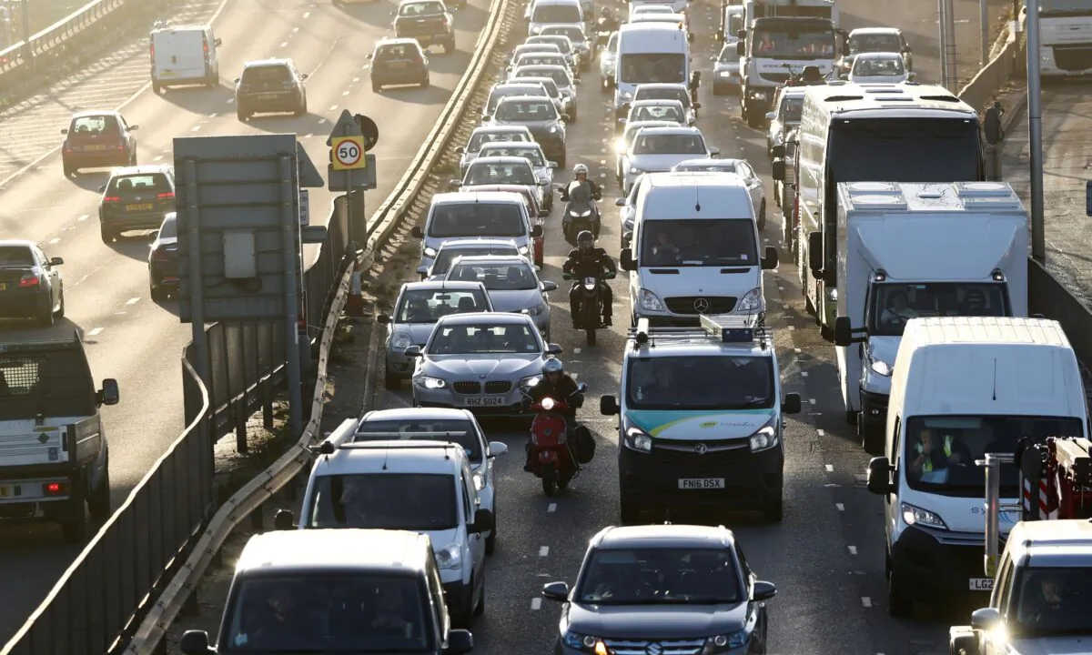 Vehicles sitting in traffic approach the Blackwall Tunnel in London on Nov. 18, 2020. (Simon Dawson/Reuters)