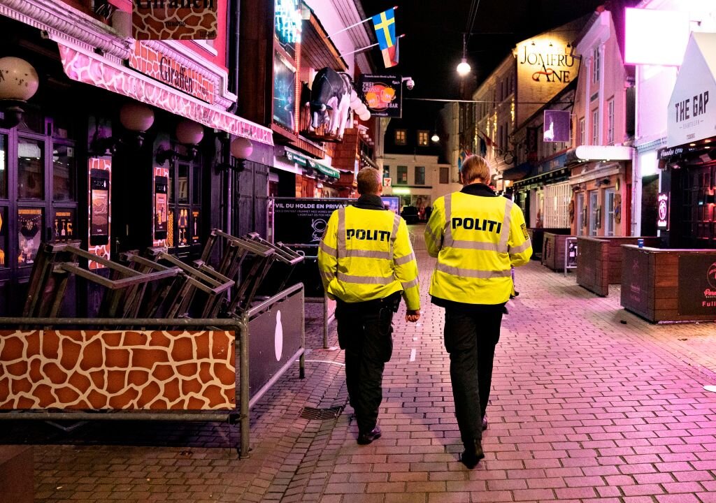 Police patrol the well-known amusement street Jomfru Ane Gade in Aalborg, Denmark on Sept. 19, 2020, as restaurants and bars have to close at 10 p.m. to help curb the rising COVID-19 cases. (Henning Bagger/Ritzau Scanpix/AFP via Getty Images)