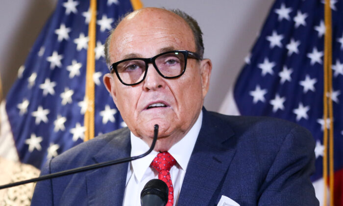 President Donald Trump attorney and former New York Mayor Rudy Giuliani speaks at a press conference at the Republican National Committee headquarters in Washington on Nov. 19, 2020. (Charlotte Cuthbertson/The Epoch Times)