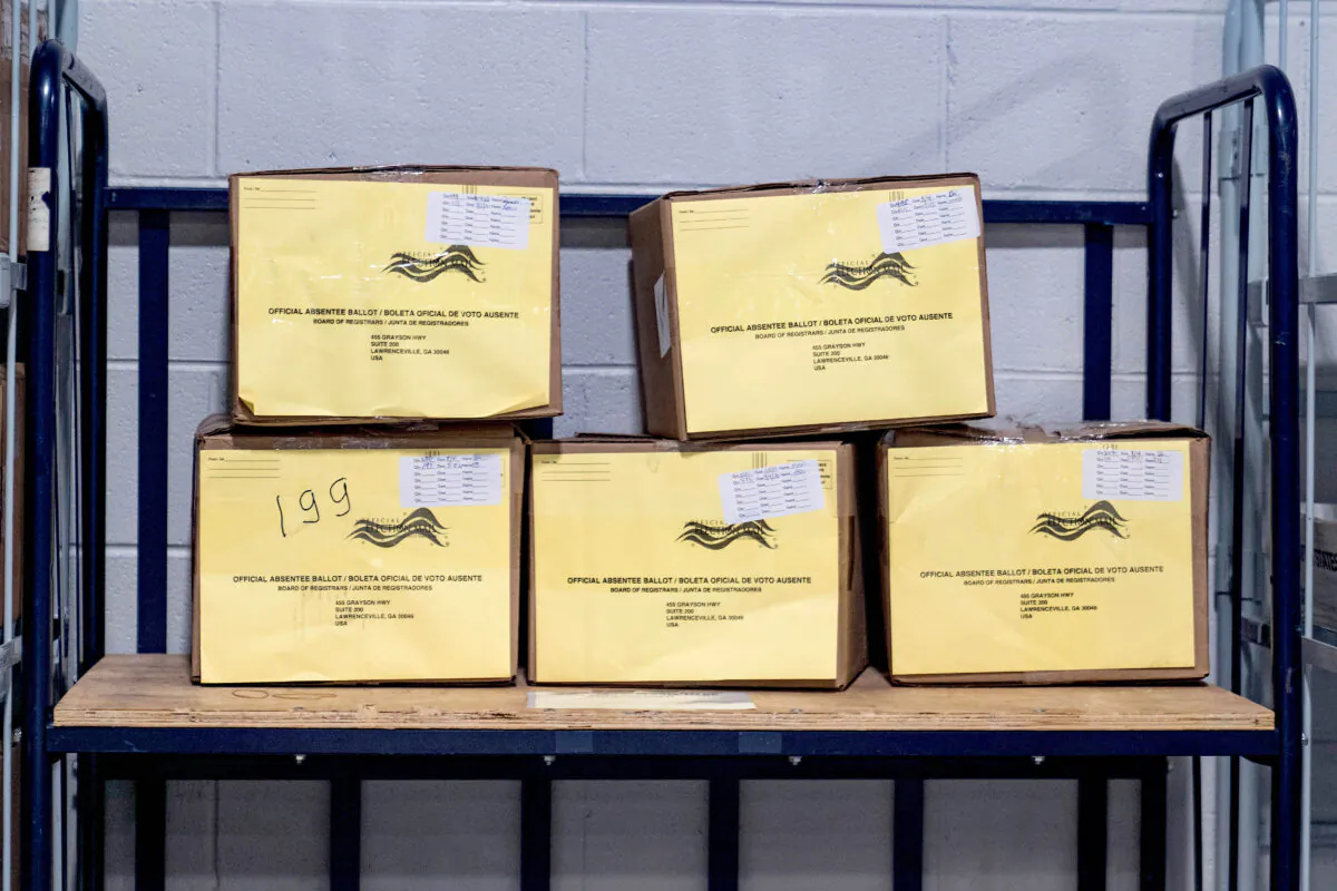 Boxes of ballots are seen as Gwinnett County election workers handle ballots as part of the recount for the 2020 presidential election in Lawrenceville, Georgia, on Nov. 16, 2020. (Megan Varner/Getty Images)
