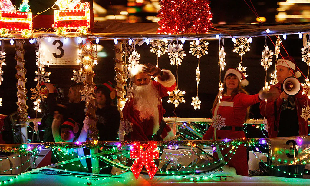 Boats in the 101st annual Newport Beach Christmas Boat Parade are lit with Christmas decorations as they move through the night in Newport Beach, Calif., on Dec. 16, 2009. (David McNew/Getty Images)