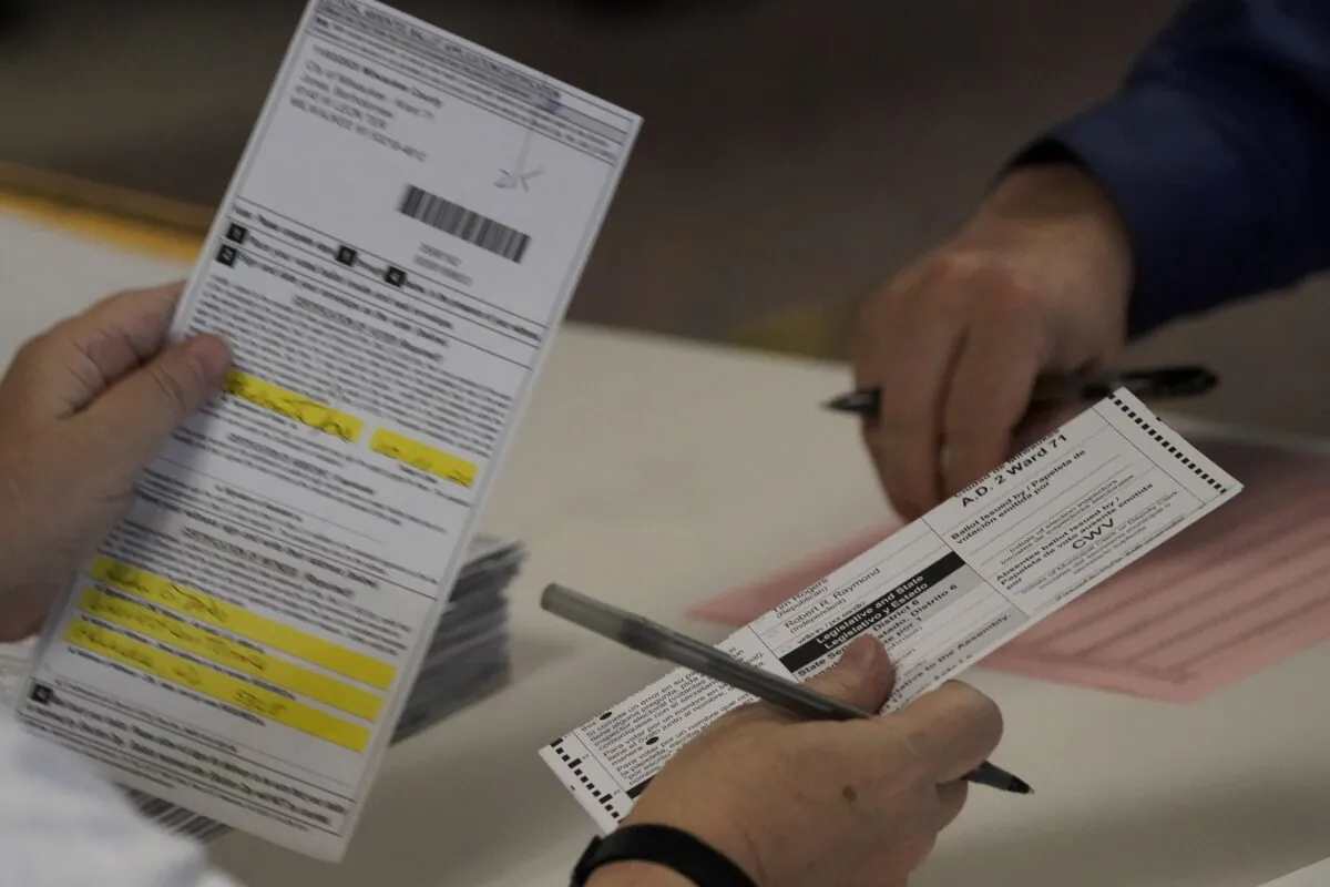 Workers count Milwaukee County ballots on Election Day at Central Count in Milwaukee, Wis., on Nov. 3, 2020. (Morry Gash/AP Photo)