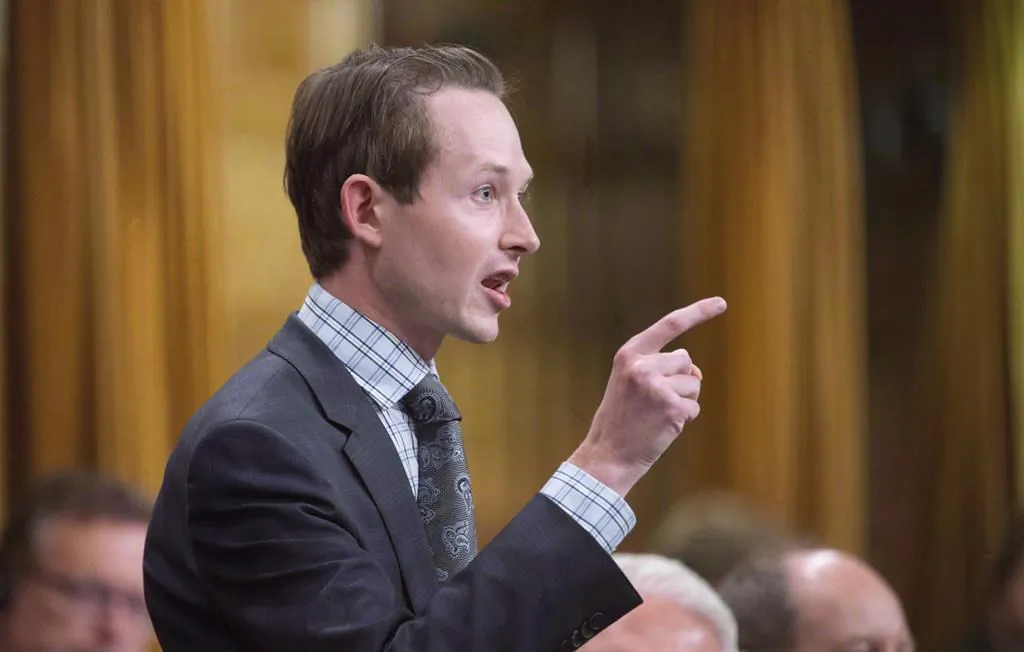 Conservative MP Michael Cooper rises during question period on Parliament Hill in Ottawa in a file photo. THE CANADIAN PRESS/Adrian Wyld