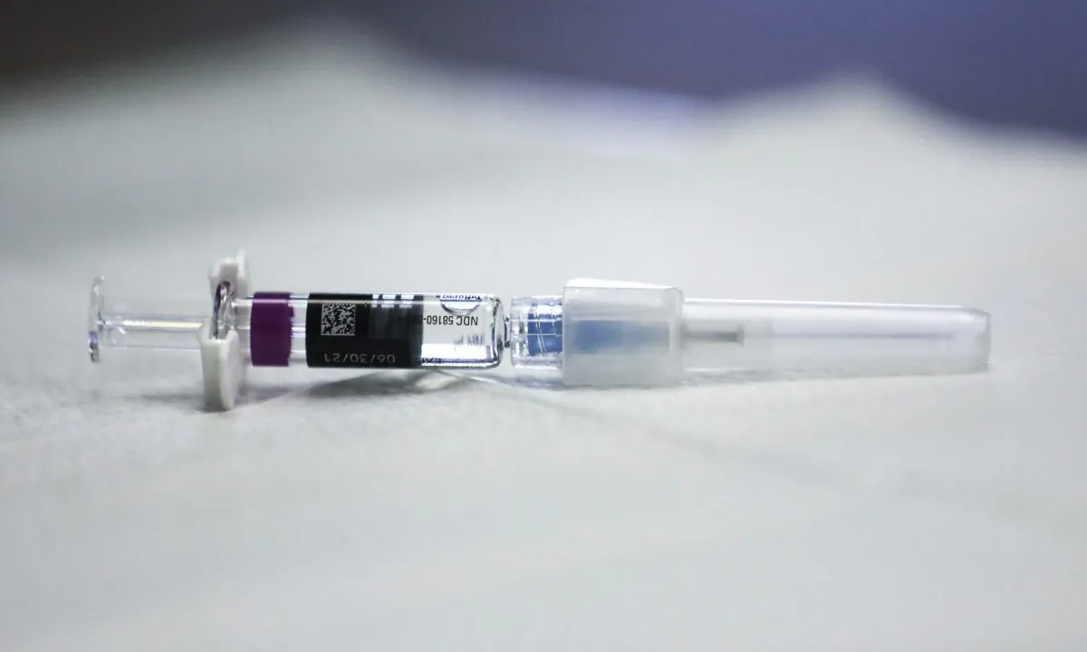 A flu vaccine syringe rests on a table, in Lakewood, Calif., on Oct. 14, 2020. (Mario Tama/Getty Images)