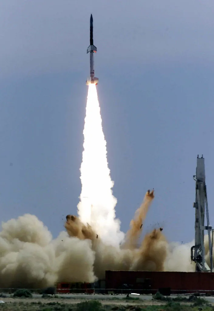 A Terrier Orion Mk70 rocket carrying a hypersonic air-breathing (scramjet) engine blasts off from the remote Woomera rocket range, some 500kms north of Adelaide, Oct. 30, 2001.  (STR/Getty Images)