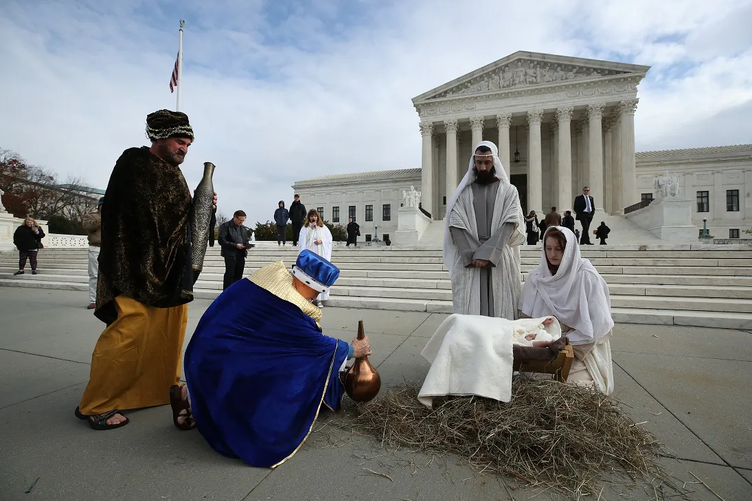 A couple portrays Mary and Joseph during a live nativity scene in front of the U.S. Supreme Court, on Capitol Hill in Washington on Dec. 4, 2019. (Mark Wilson/Getty Images)