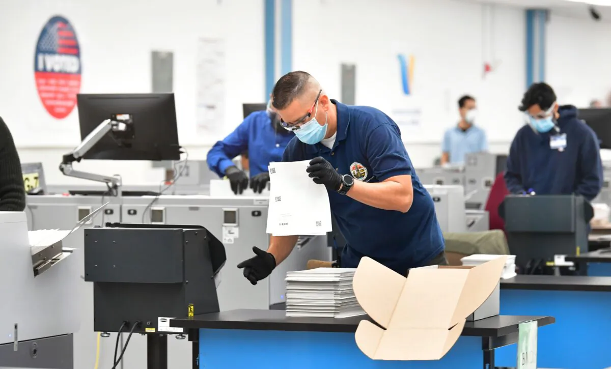 Ballots are counted at the Los Angeles County Regional Offices in Downey, after the polls closed for the 2020 US Elections, Calif., on Nov. 3, 2020. (Frederic J. Brown / AFP via Getty Images)