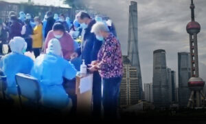 China Insider: Shanghai Locks Down Communities After Airport Employee Tests Positive