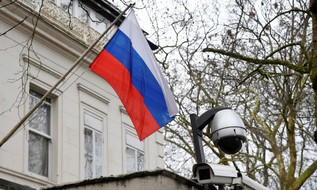 A flag flies outside the consular section of Russia's Embassy in London, on March 20, 2018. (Toby Melville/Reuters)