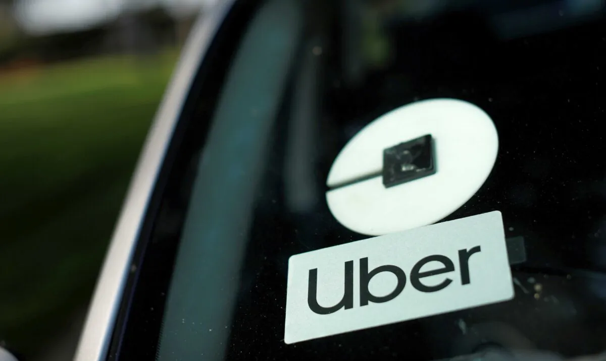 An Uber logo is shown on a rideshare vehicle in Los Angeles, Calif., on Aug. 20, 2020. (Mike Blake/Reuters)