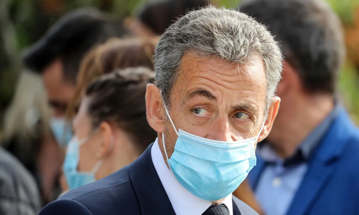 Former French President Nicolas Sarkozy attends a ceremony in Nice, southern France, on Oct. 29, 2020. (Valery Hache/Pool via AP)