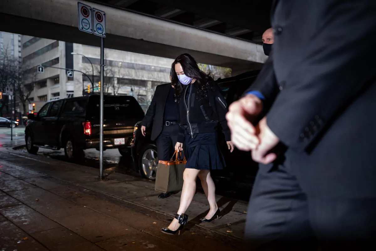 Meng Wanzhou, chief financial officer of Huawei, arrives at B.C. Supreme Court to attend a hearing, in Vancouver, on Tuesday, November 24, 2020. (Darryl Dyck/The Canadian Press)
