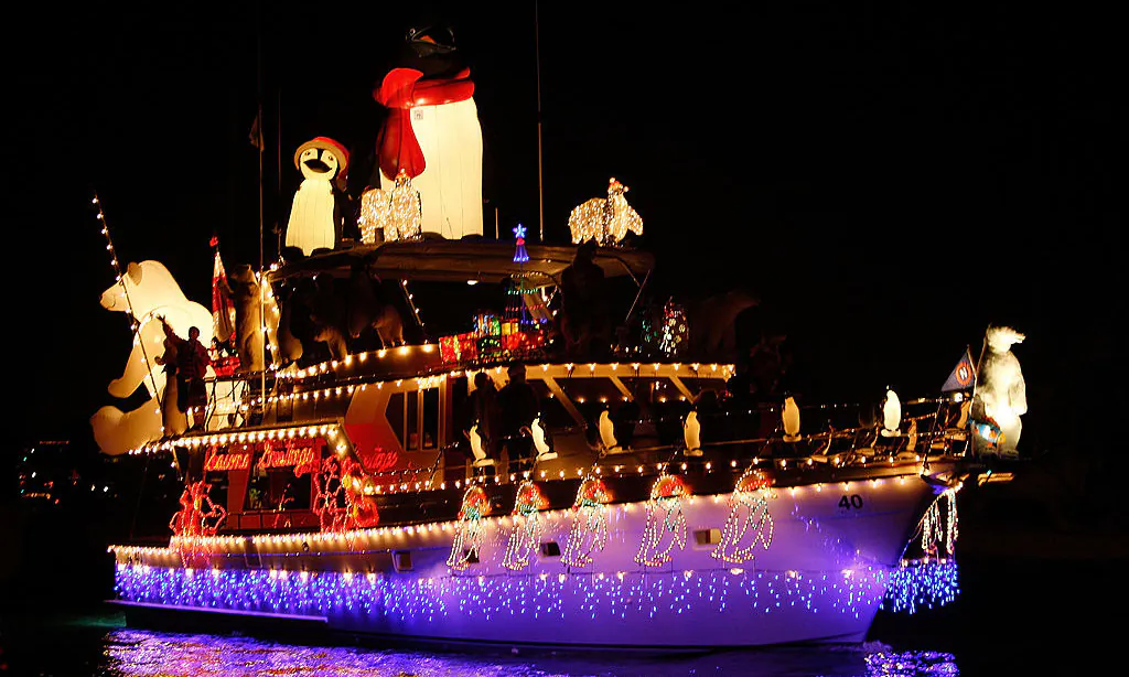 Boats in the 101st annual Newport Beach Christmas Boat Parade are lit with Christmas decorations as they move through through the night in Newport Beach, Calif., on Dec. 16, 2009. (David McNew/Getty Images)