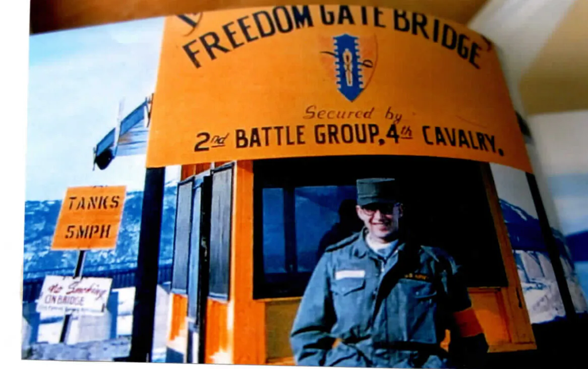 The author standing at the south entrance of the Freedom Gate Bridge, a one-lane bridge from South Korea into North Korea, in 1956. (Courtesy of H. Vern Brazell)