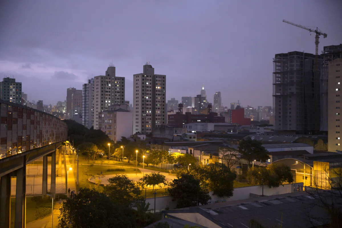 The Sao Paulo skyline is seen at dusk in Sao Paulo, Brazil, on June 21, 2014. (Oli Scarff/Getty Images)