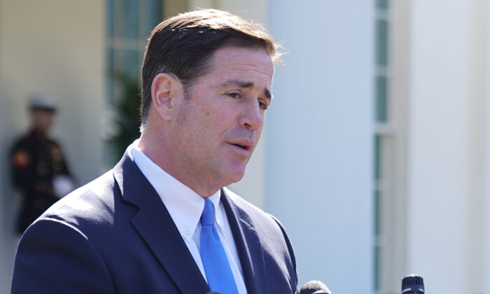 Arizona Gov. Doug Ducey talks to reporters at the White House in Washington on April 3, 2019. (Chip Somodevilla/Getty Images)